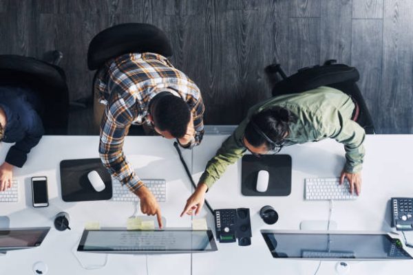 High angle shot of a group of call centre agents working in an office